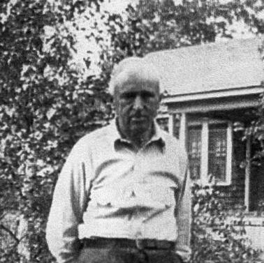 black and white older man in a rural residence setting